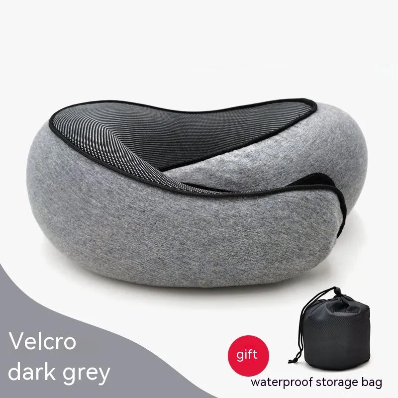 Gray neck pillow with black mesh and a matching storage bag on a white background